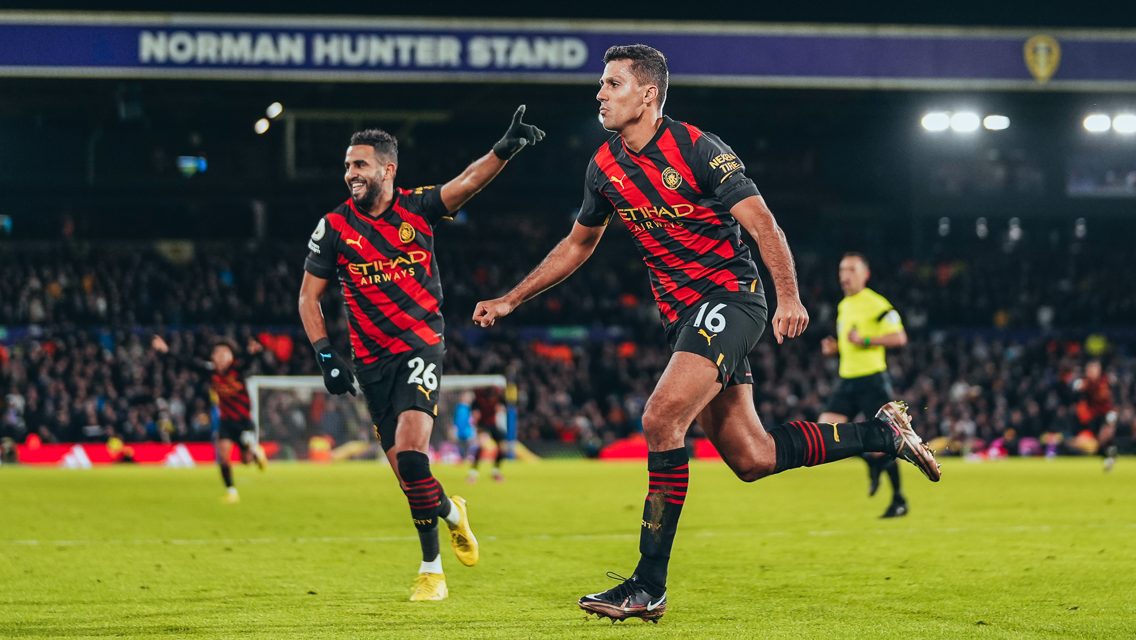 GOAL: Rodri wheels away to celebrate the opener.