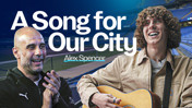 Music header featuring text 'A Song for Our City' with 'Alex Spencer' at a stadium, containing two individuals and a guitar.