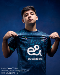 A person holding a dark blue jersey with Etisalat and Manchester City Esports logos. Text reads: Ander ‘Neat’ Tobal, October 2024 - August 2025, Title: EA Sports FC.