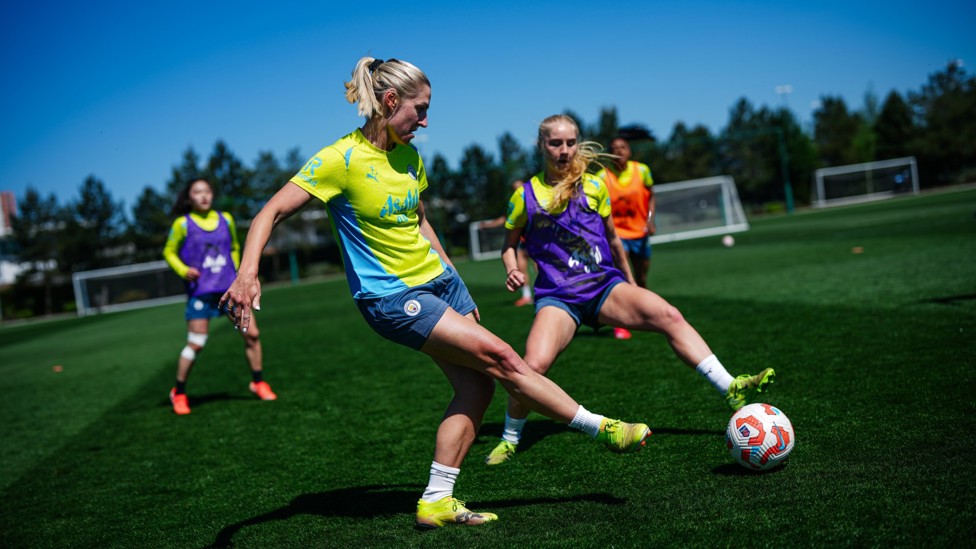 PASS AND MOVE  : Laura Coombs keeps a move flowing. 