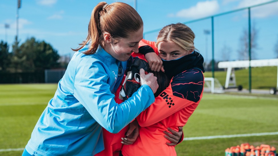 GUESS WHO : Who do you think Sandy MacIver and Chloe Kelly are hugging tightly?