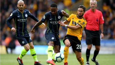 BY THE RIGHT: Raheem Sterling fizzes in a shot on the Wolves goal but is denied by Patricio's wonder save