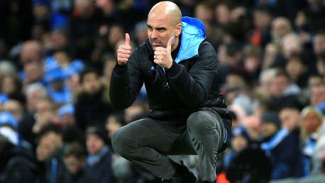 THUMBS UP: Guardiola signals his approval from the touchline.