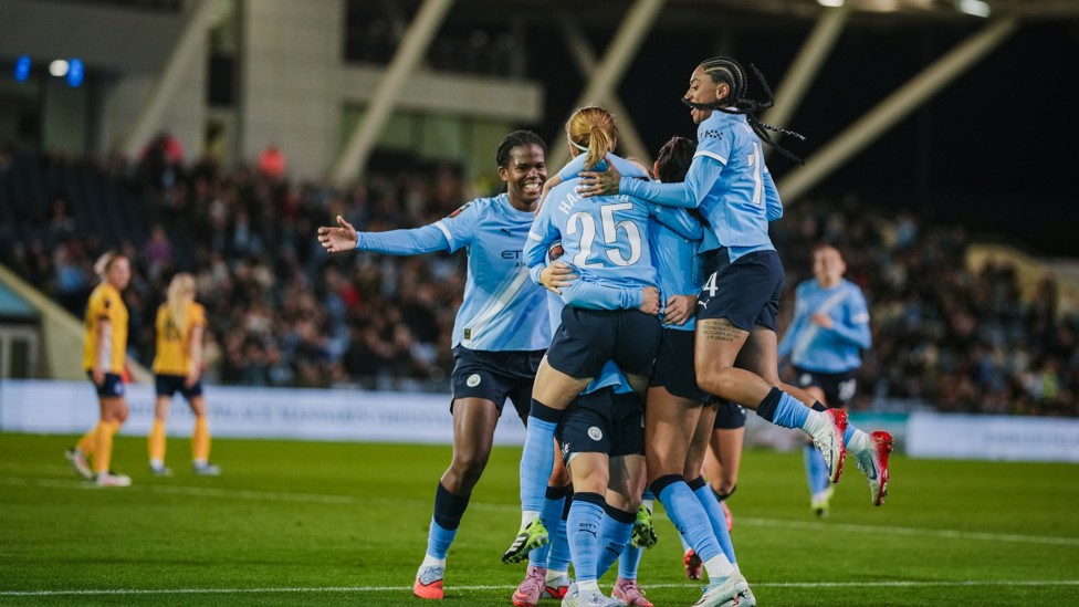 ALL TOGETHER NOW : The team celebrates Yui's winner!