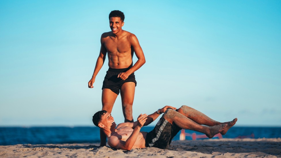 BEACH BOYS: Rico Lewis and Phil Foden share a light-hearted moment.