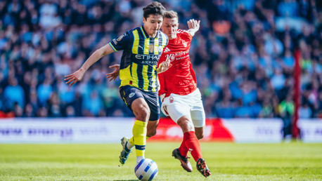 CALM AND COMPOSED: Khusanov on the ball.