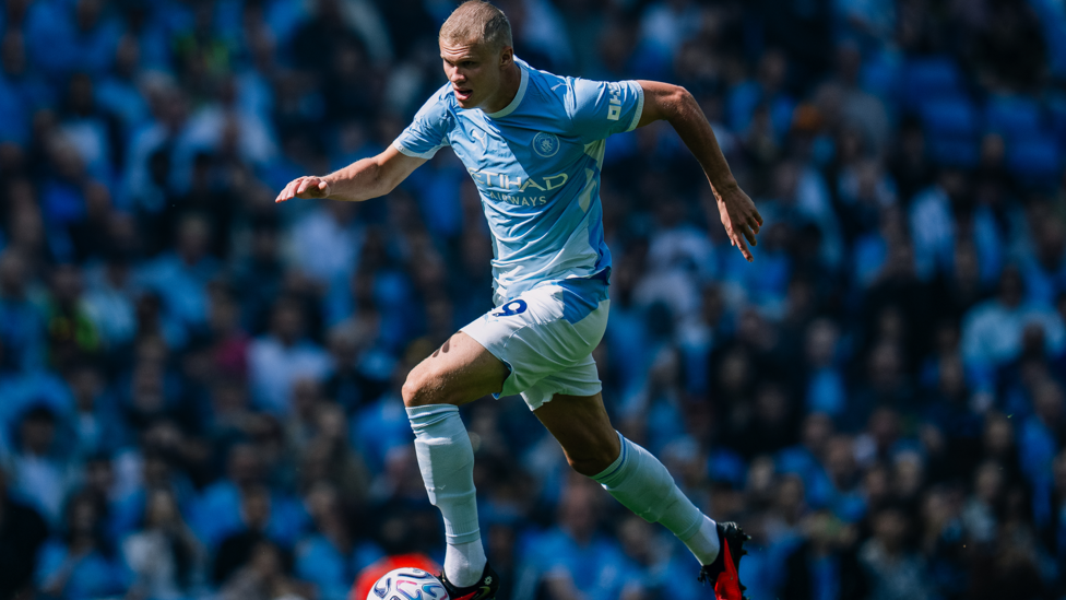 A CUT ABOVE: A freshly shorn Erling Haaland takes the fight to Bournemouth.