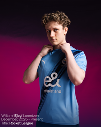 Esports player William 'Ejby' Lorentzen wearing a Manchester City esports jersey with Etisalat sponsor, standing against a gradient background.