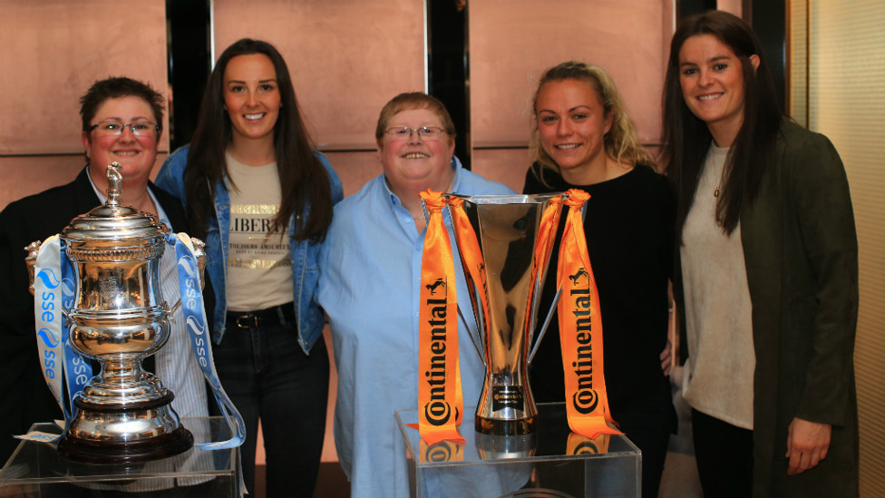 FAB FIVE : Fans took snaps with the players and trophies