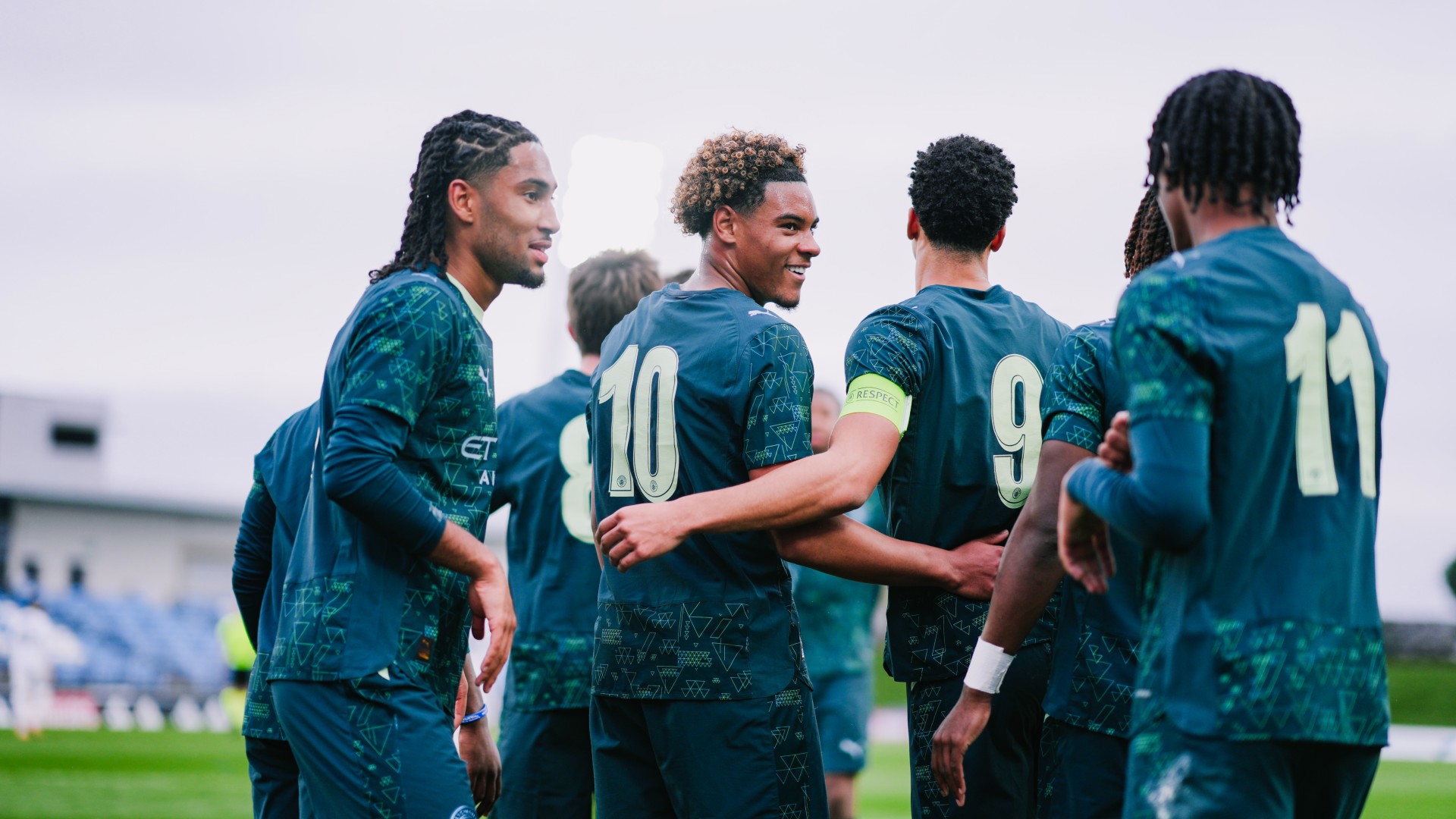ALL SMILES : The squad celebrate Charlie Gray's goal. 