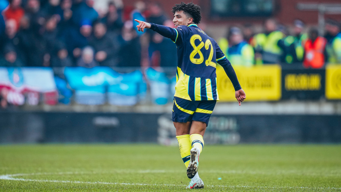 IT'S YOURS: Lewis credits the goal to Khusanov!