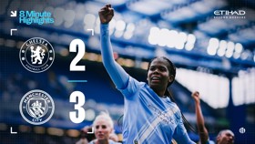 Scoreboard showing Chelsea 2 - 3 Manchester City with a Manchester City player celebrating.