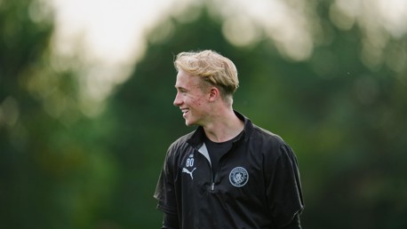 Person in a Manchester City training kit with number 80 and Puma branding.