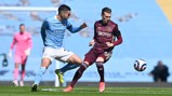 BATTLE: Torres and Alioski involved in an early tussle
