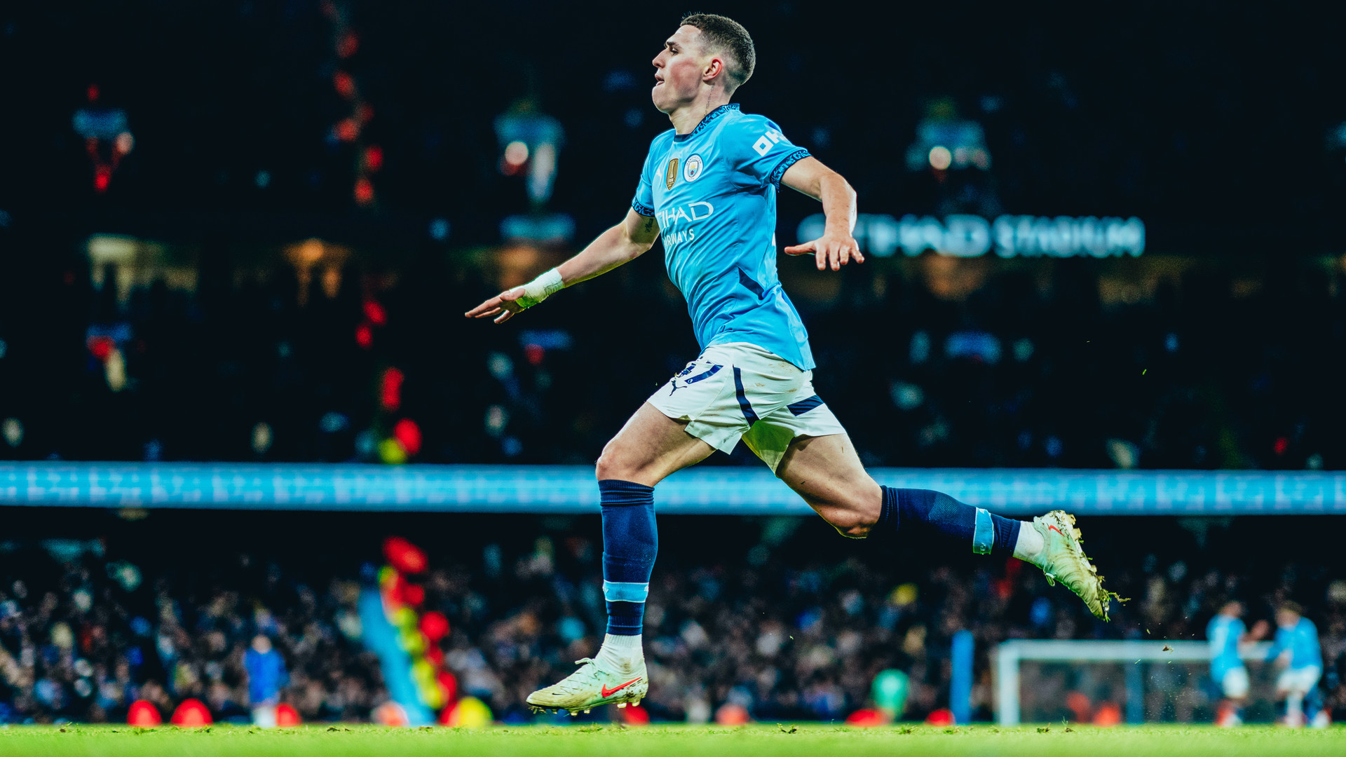 PHIL YER BOOTS: Phil Foden starts the celebration after City's third goal.