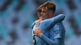 DAYLIGHT: Cole Palmer celebrates with Tommy Doyle after grabbing City's second