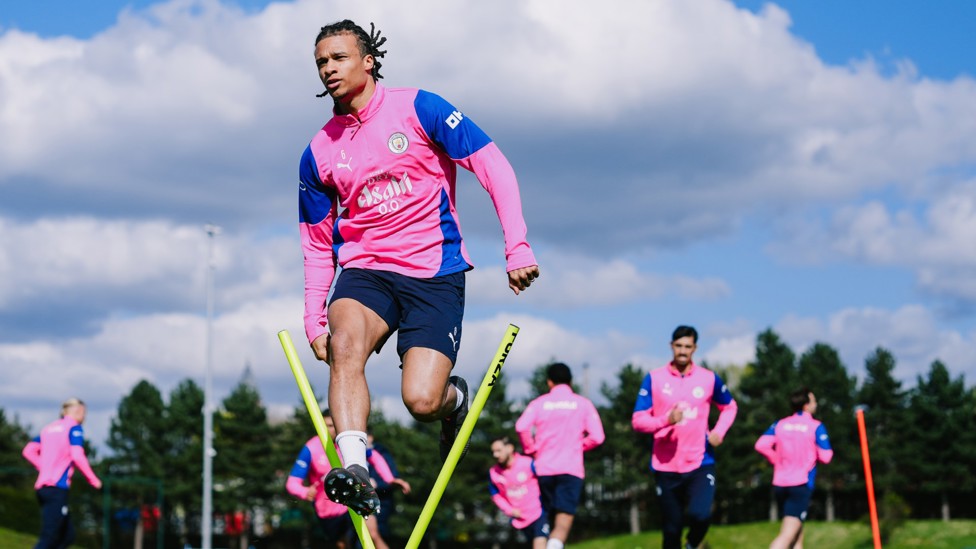JUMPING FOR JOY : Nathan Ake leaps over the hurdle