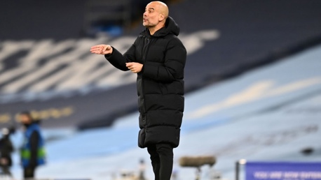 PEP TALK: The boss passes on his instructions from the touchline.