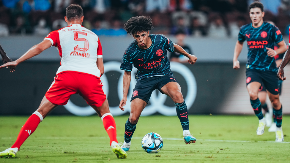 PUSHING ON : Our No.82 looks to take on Bayern Munich having been selected in an attacking midfield role.