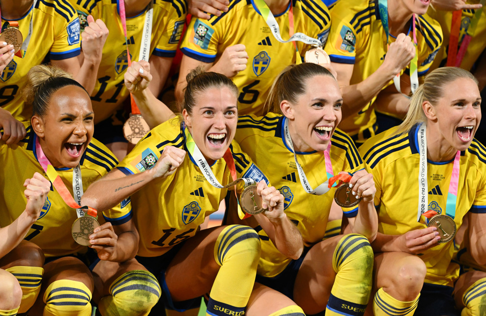 TRIUMPH : Filippa Angeldahl celebrates with her teammates as they win third-place medals following their victory over Australia. 