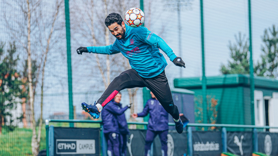 HEADY HEIGHTS : Ilkay Gundogan gets up high