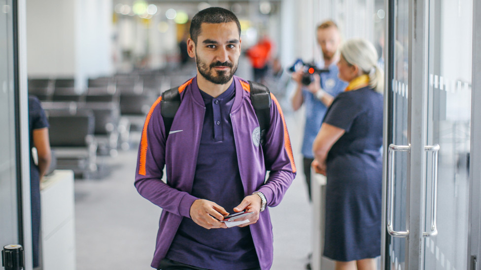 GUNDO : Ilkay steps on the plane ready to return to Germany.