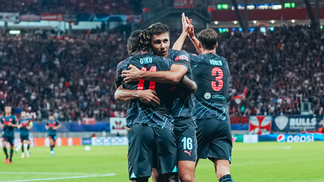 HUG: Rodri celebrates with Doku.