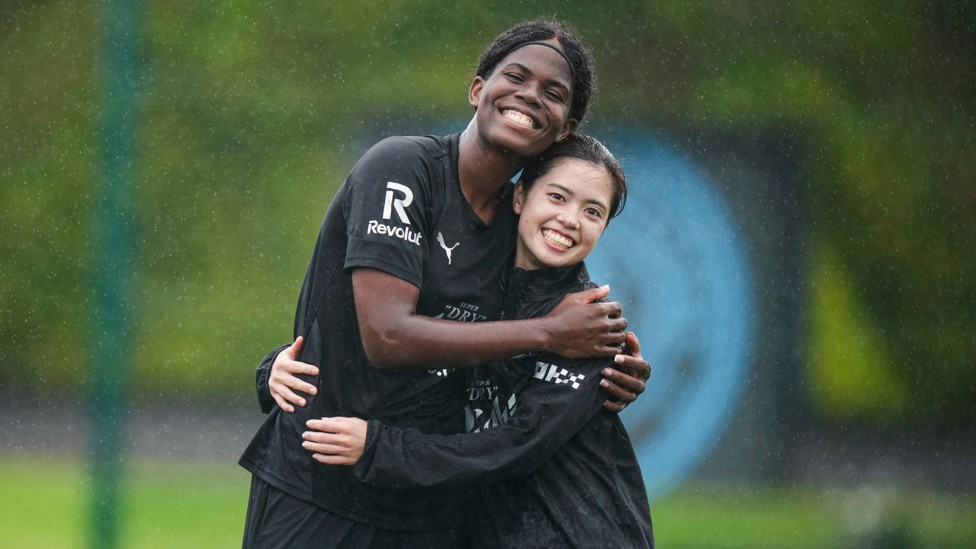 SMILE! : Khadija 'Bunny' Shaw and Yui Hasegawa pose for the club photographer.