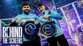 Two esports players hold Manchester City ePremier League championship plaques amidst confetti. The event is titled 'Behind the Screens' and features the Manchester City Esports logo.