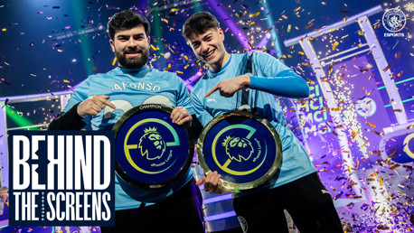 Two esports players hold Manchester City ePremier League championship plaques amidst confetti. The event is titled 'Behind the Screens' and features the Manchester City Esports logo.