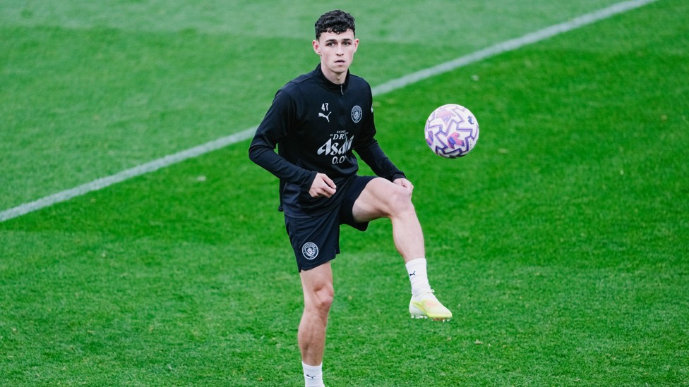 HOW'S YOUR TOUCH? : Phil Foden prepares to take the ball down