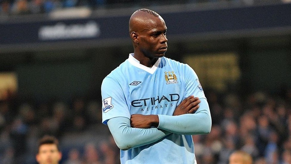 SUPER MARIO  : Mario Balotelli celebrates the opening penalty in trademark fashion