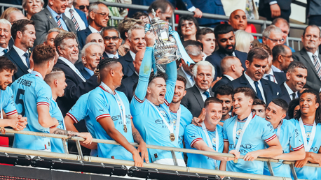 SUPER JACK: Lifts the trophy.