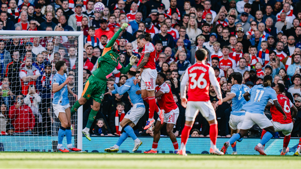 FEARLESS: Donnarumma punches the ball away