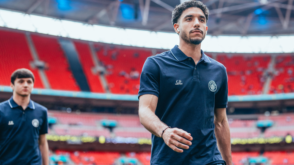 MARMOUSH MARCH : Striding towards the dressing room.
