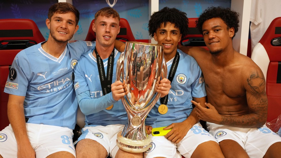 SMILE FOR THE CAMERA : Rico Lewis, alongside James McAtee, Cole Palmer and Oscar Bobb, celebrate City's Super Cup success.