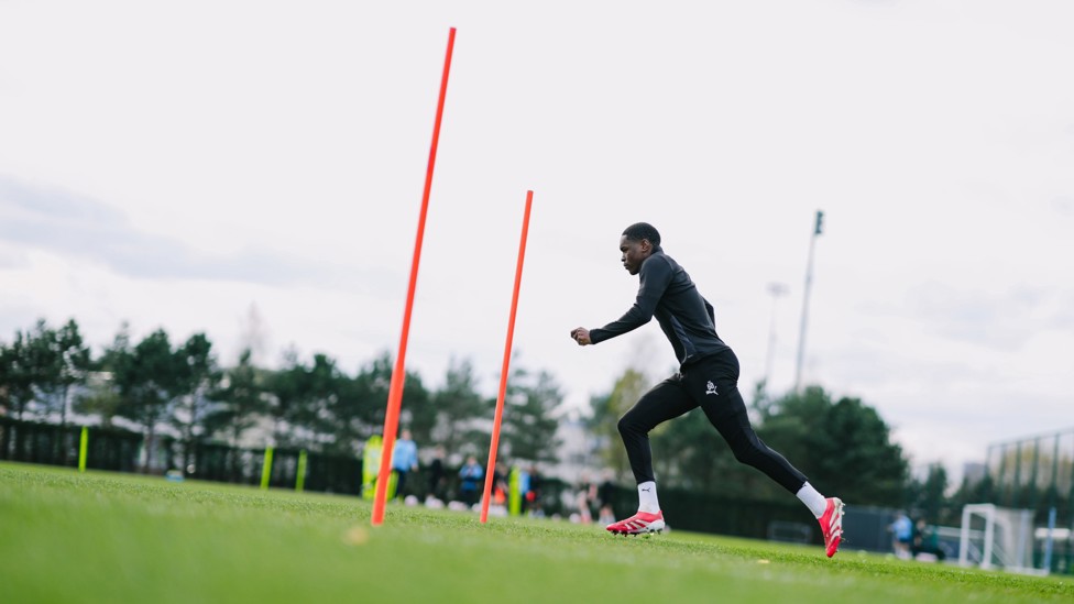 DODGE AND WEAVE : Femi Fapetu makes his way around the training poles.