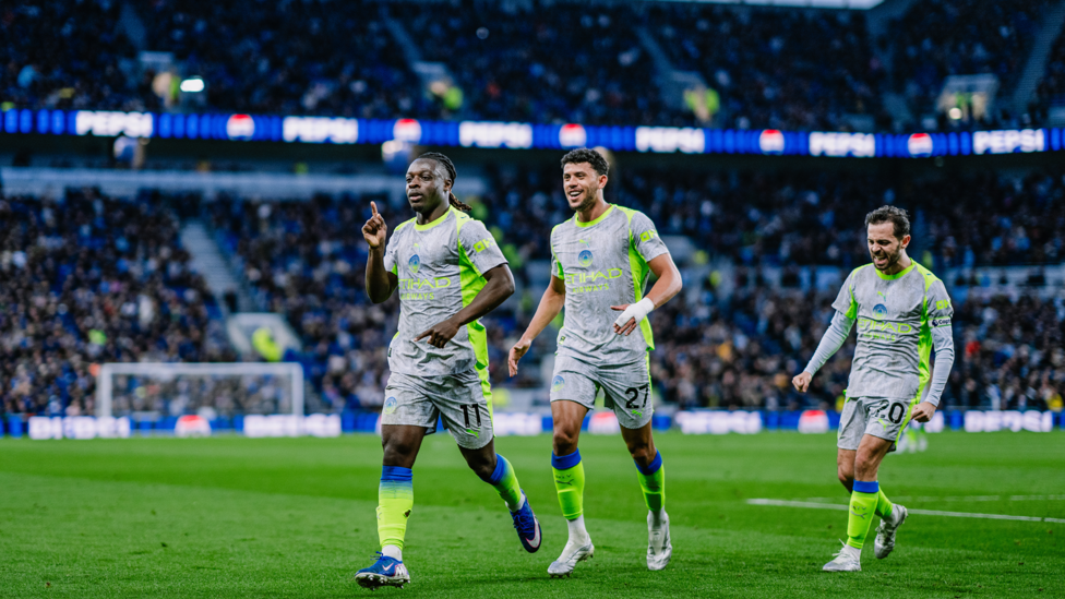 DEADLY DOKU : Wheels away to celebrate his superb goal.