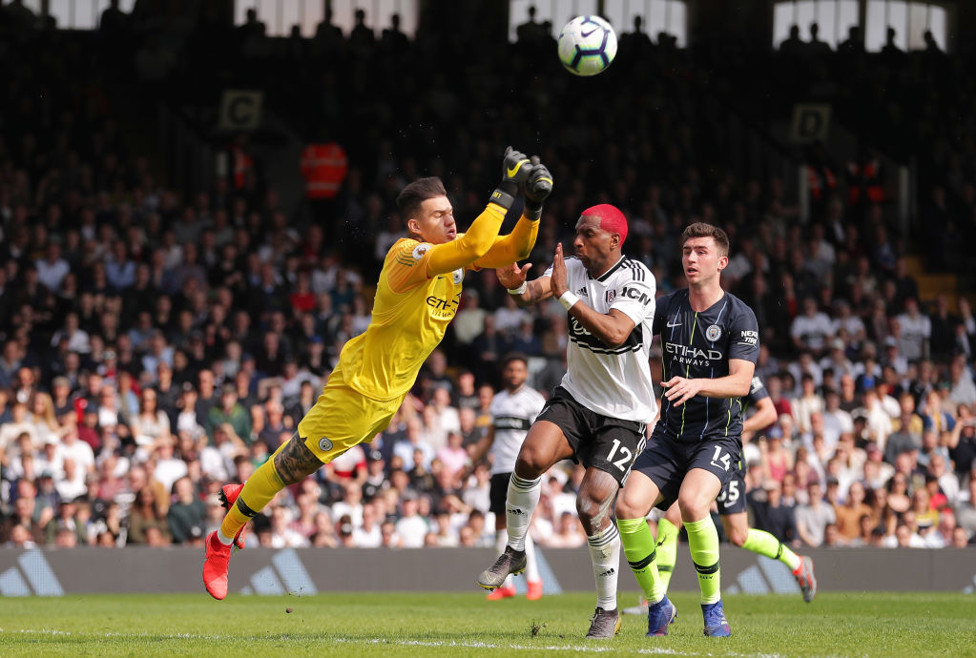 UP AND AWAY : Ederson punches clear