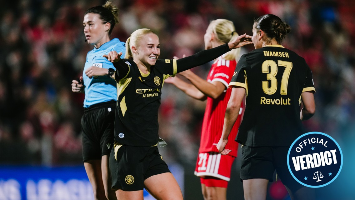 A soccer player from a team wearing black and gold celebrates with teammates during a match, with a 'Official Verdict' logo visible.