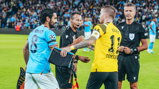 GAME TIME: Gundogan and Reus share a warm embrace - time to play!