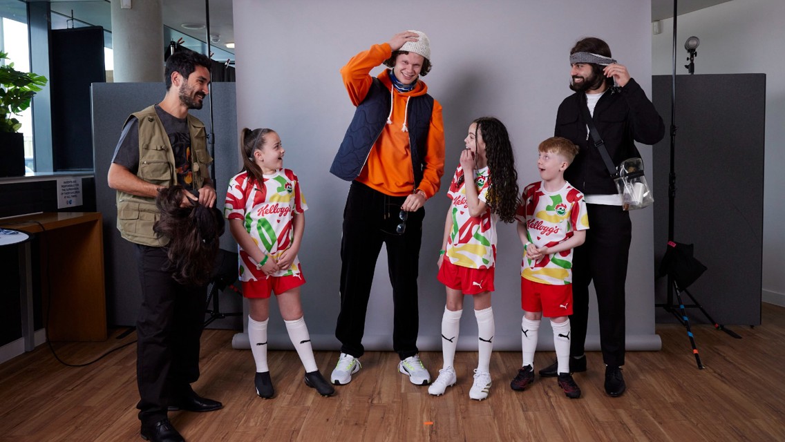 Strike a pros: Manchester City footballers surprise young fans at Kellogg's shoot for new shirt launch