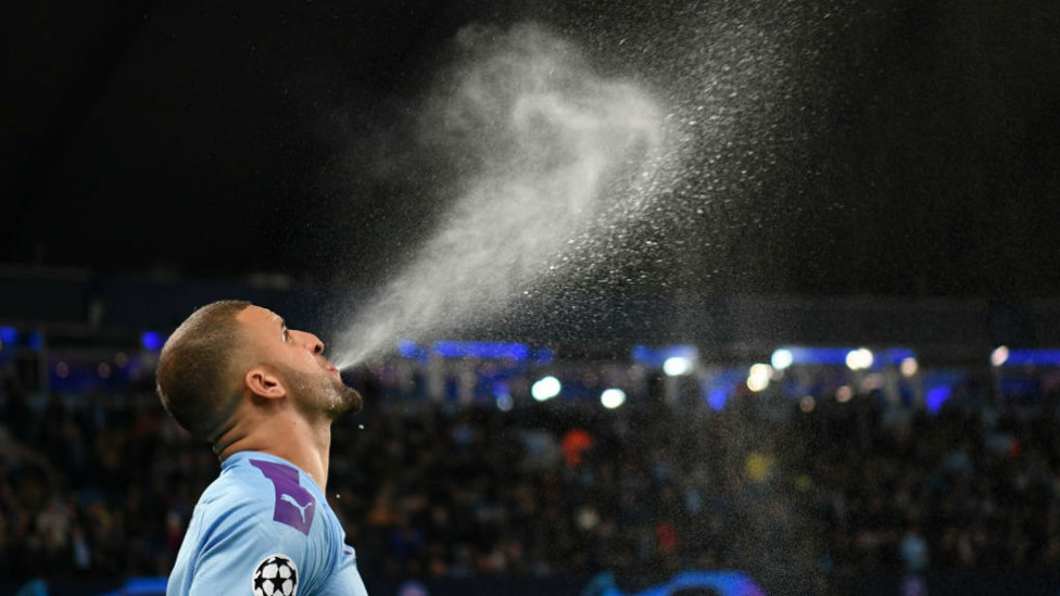 WATER BREAK : Walker prepares for the game in his inimitable way