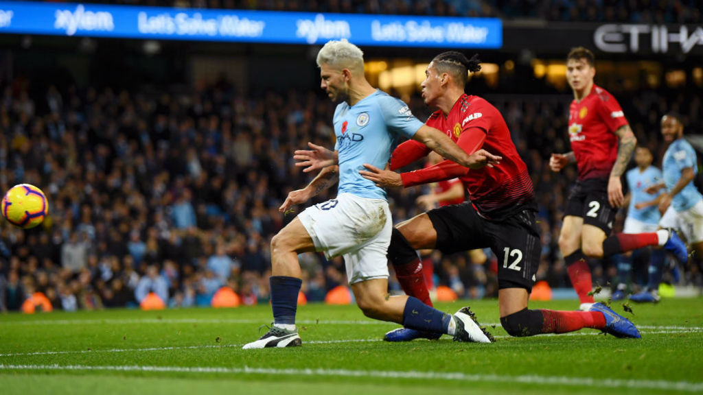 POWER SERGE : Kun goes close as he powers in on goal