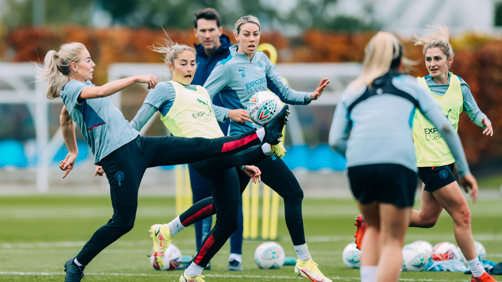 HARD YARDS : Alex Greenwood and Janine Beckie battle for possession