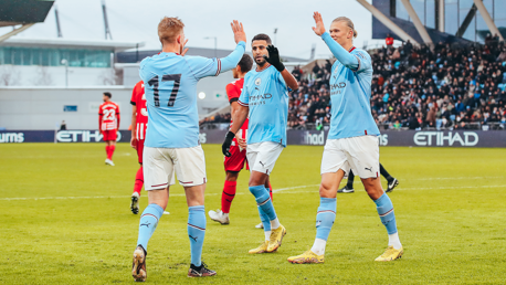 HIGH FIVES: Haaland, Mahrez and KDB celebrate after we double the lead.