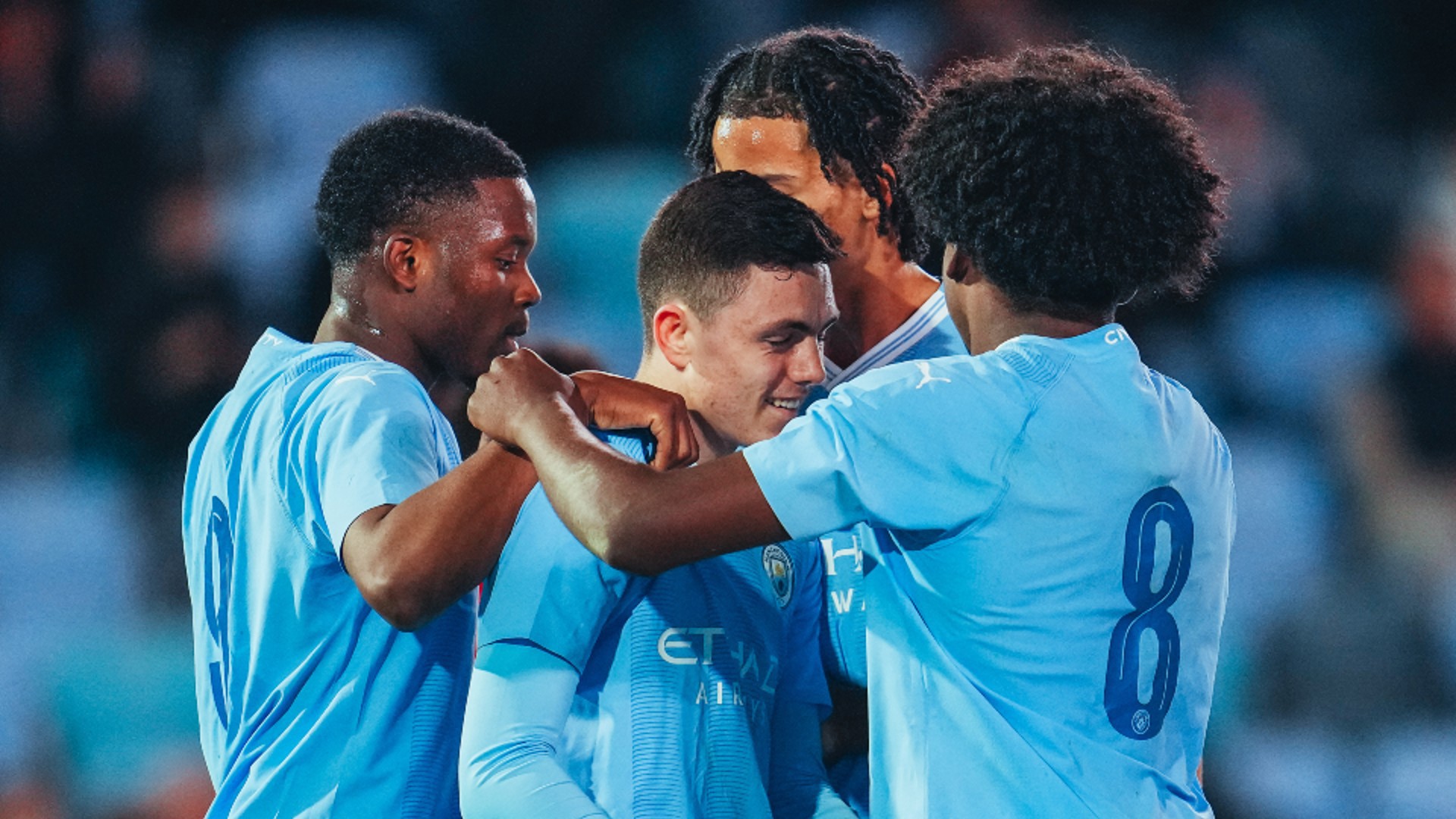 CELEBRATION TIME: Ashton Muir and his colleagues are all smiles.