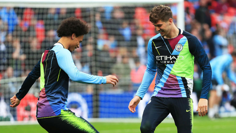 IMPRESSED : The unique jersey has put a smile on the faces of Leroy Sane and John Stones.