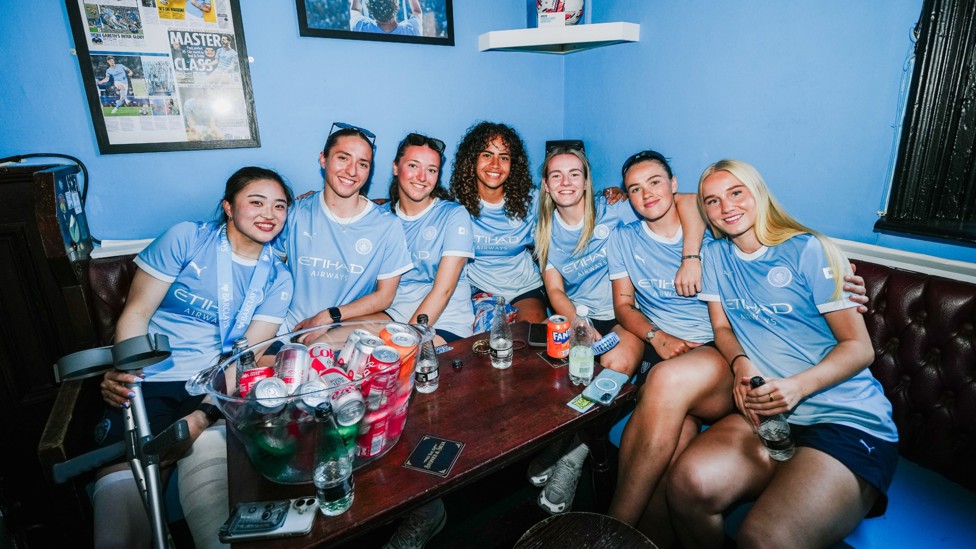 DOWN THE PUB : The women's team enjoy a refreshment