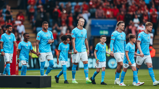 SQUAD GOALS: City's starters make their way onto the pitch.